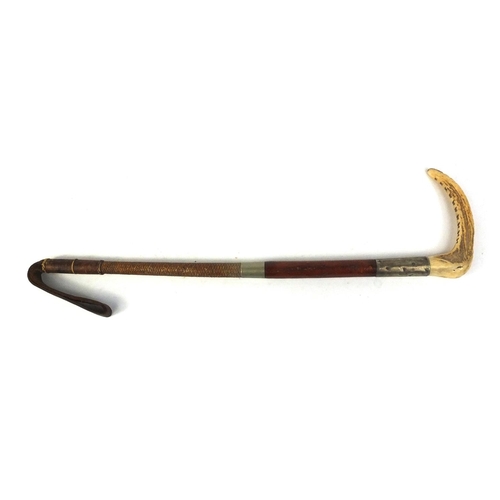 242 - Horn handled leather riding crop with silver coloured metal collar, 47cm long