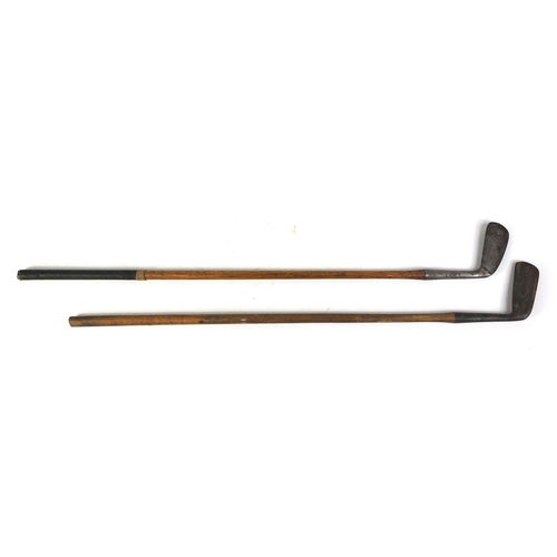 309 - Two antique wooden shafted golf clubs comprising MacDonald putter and Morrisson Williams 2 iron