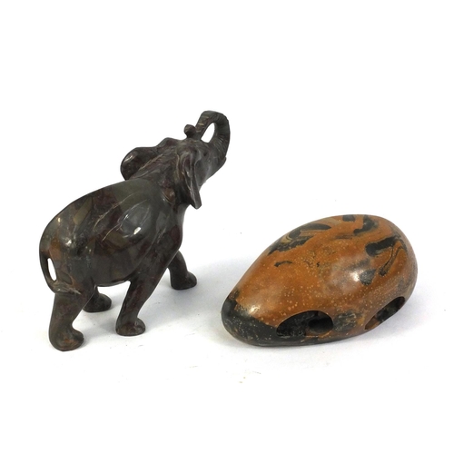 670 - Two carved soapstone studies of a tortoise and an elephant, the largest 14cm high