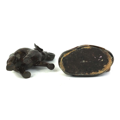 670 - Two carved soapstone studies of a tortoise and an elephant, the largest 14cm high