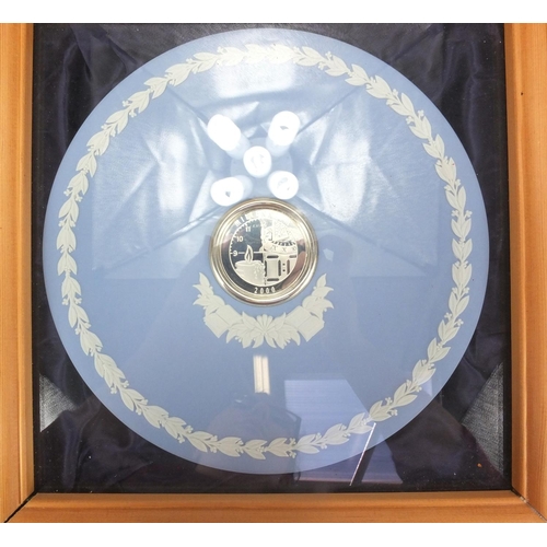 2299 - Millennium 2000 commemorative silver pin dish with inset five pound coin, together with a Millennium... 