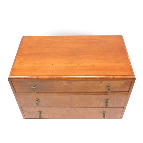 2039 - Art Deco figured walnut four drawer chest by Waring & Gillow, raised on cabriole feet, 90cm high x 7... 