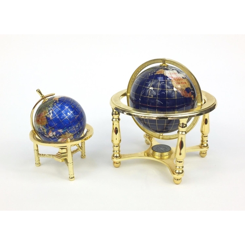 2103 - Two gem stone desk globes, the larger with compass inset under tier, the larger 25cm high