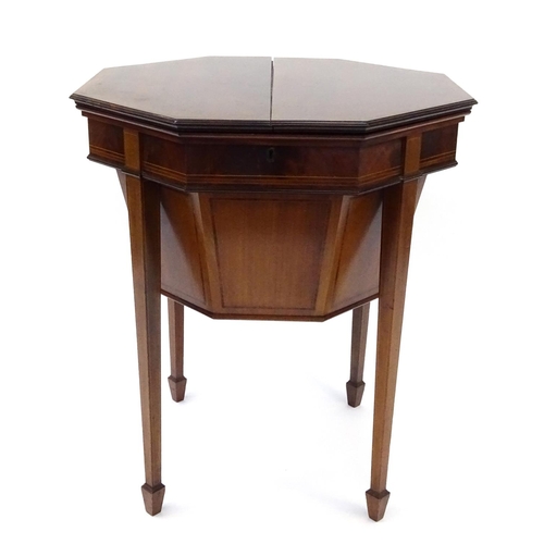 2014 - Victorian inlaid mahogany octagonal work box, with lift out fitted interior raised on tapering legs,... 