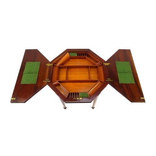 2014 - Victorian inlaid mahogany octagonal work box, with lift out fitted interior raised on tapering legs,... 