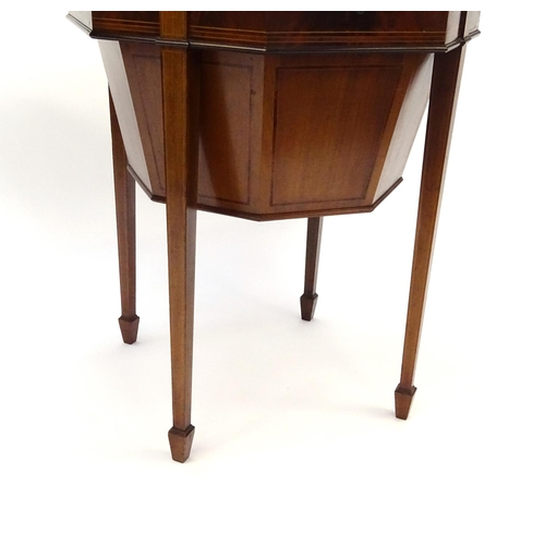2014 - Victorian inlaid mahogany octagonal work box, with lift out fitted interior raised on tapering legs,... 