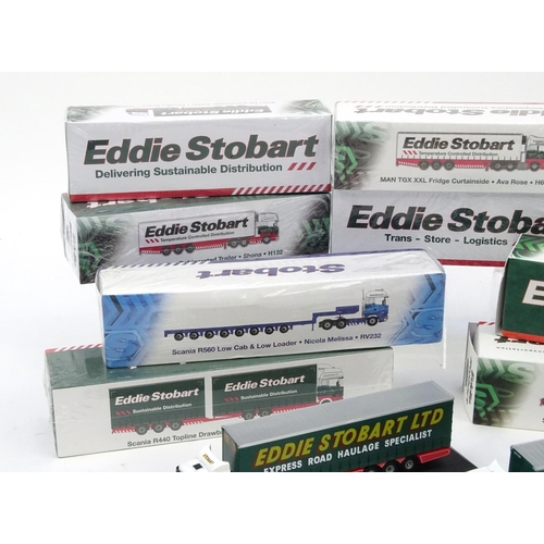 2191 - Twelve Atlas edition Eddie Stobart haulage lorries, all with boxed, some with cellophane wrapping