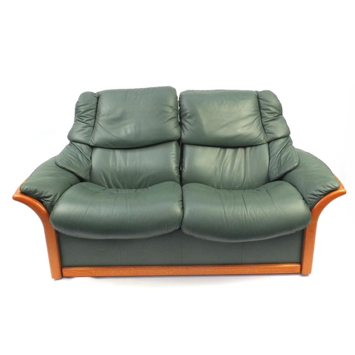 2007 - Stressless Ekornes reclining two seater settee with green leather upholstery, 173cm long