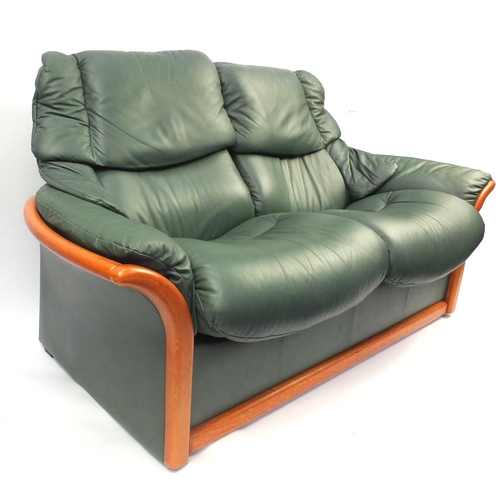 2007 - Stressless Ekornes reclining two seater settee with green leather upholstery, 173cm long