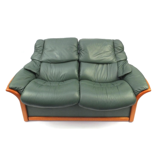 2007 - Stressless Ekornes reclining two seater settee with green leather upholstery, 173cm long