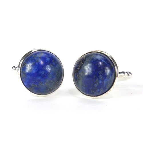 2531 - Pair of white metal cabochon lapis lazuli cuff link, 1.6cm in diameter, approximate weight 11.0g