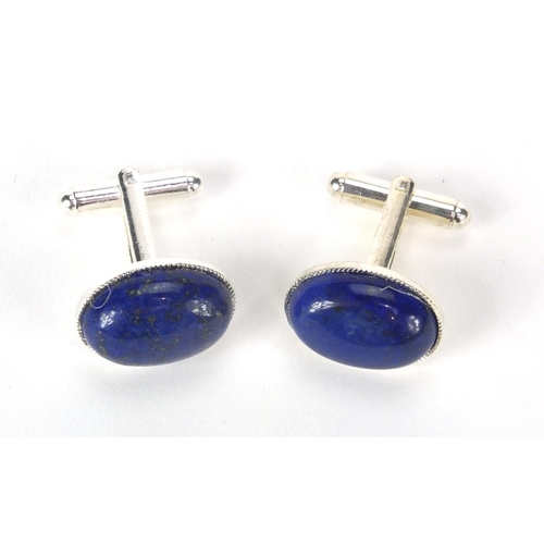 2533 - Pair of white metal cabochon lapis lazuli cufflinks, 2cm long, approximate weight 12.2g