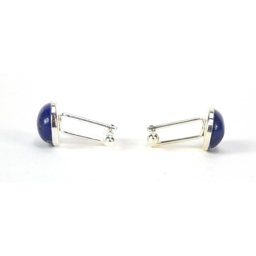 2533 - Pair of white metal cabochon lapis lazuli cufflinks, 2cm long, approximate weight 12.2g