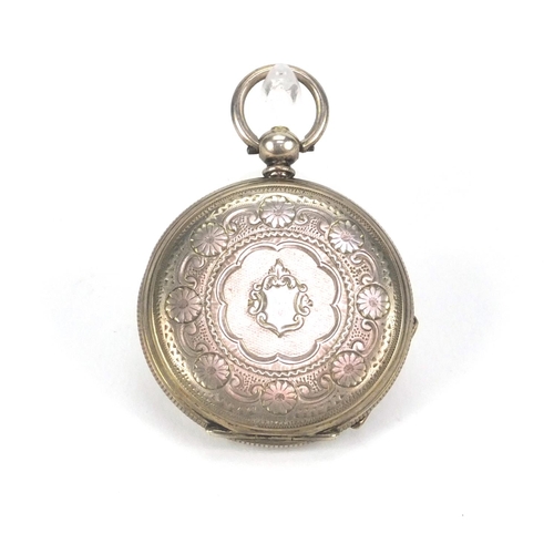 2535 - Ladies silver pocket watch with floral chased decoration and ornate silvered dial, 3.8cm in diameter... 