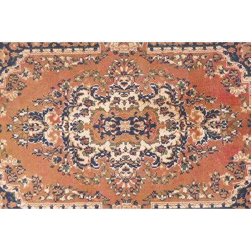 154 - Three assorted rugs two with geometric pattern and a salmon carpet runner