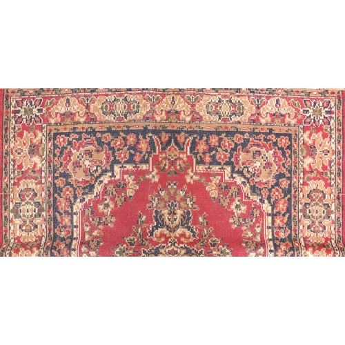 154 - Three assorted rugs two with geometric pattern and a salmon carpet runner