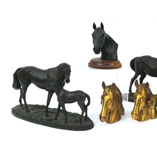 237 - Three bronze style horse groups and a pair of brass horse bust book ends, the largest 37cm long