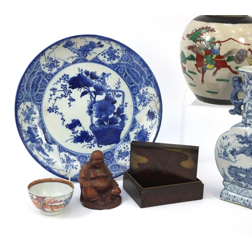 553 - Oriental items including a stoneware ginger jar and cover, blue and white charger, lacquered box and... 