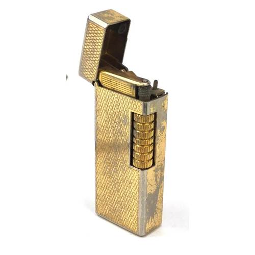 436 - Silver fountain pen with engine turned decoration, silver ingot on chain and a Dunhill style lighter