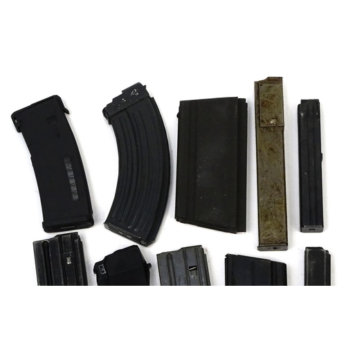 818 - Ten mixed machine gun magazines including AK47 and BAR examples