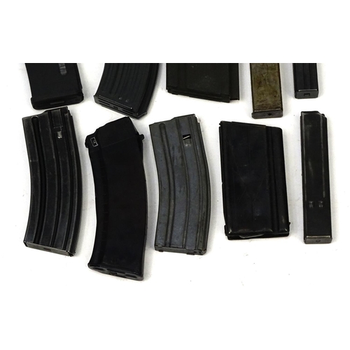 818 - Ten mixed machine gun magazines including AK47 and BAR examples