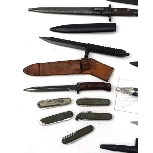 796 - Fifteen mixed knives and bayonets including fighting, German style and Military examples