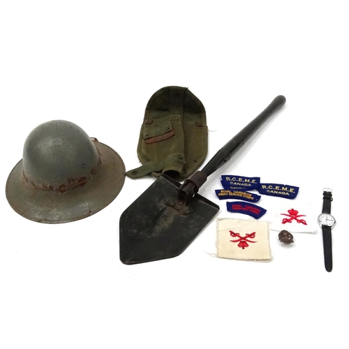 805 - Group of Military items including a US spade, tin helmet and cloth insignia