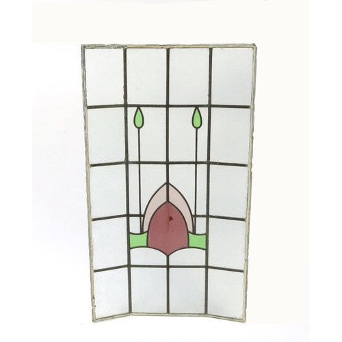 2054 - Art Nouveau leaded stained glass window panel with stylised motifs, 101cm x 60cm