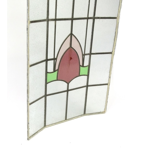 2054 - Art Nouveau leaded stained glass window panel with stylised motifs, 101cm x 60cm