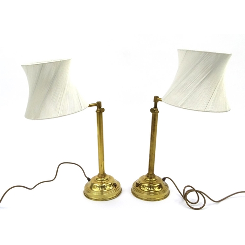 2083 - Pair of adjustable brass lamps with shades, each 60cm high