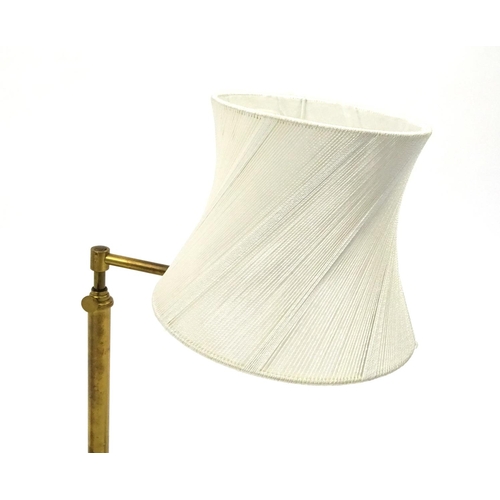 2083 - Pair of adjustable brass lamps with shades, each 60cm high