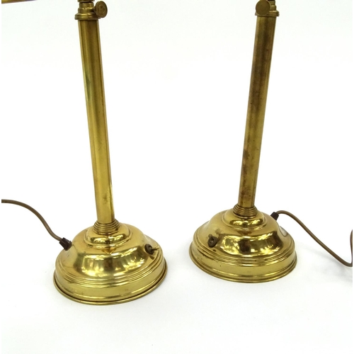 2083 - Pair of adjustable brass lamps with shades, each 60cm high