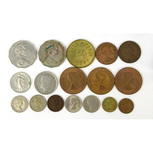 702 - Box of assorted World coins including British pre-decimal examples and French and Spanish