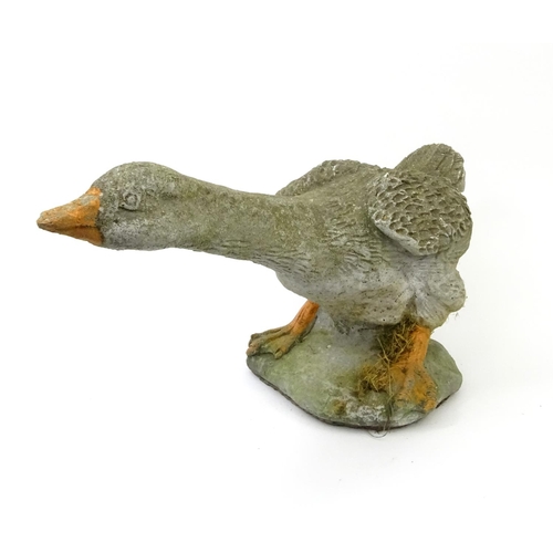 171 - Garden stoneware model of a goose, 63cm long