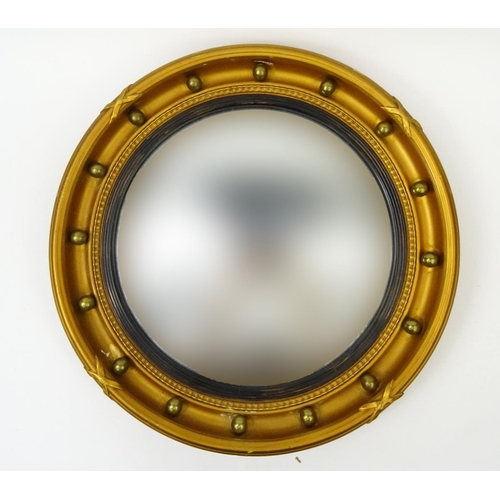 111 - Circular gilt framed convex mirror, 48cm in diameter