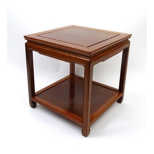 63 - Oriental hardwood occasional table with under tier, 59cm high x 56cm square