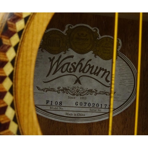 720 - Washburn wooden acoustic guitar, model F1OS with paper label and serial number to the inside