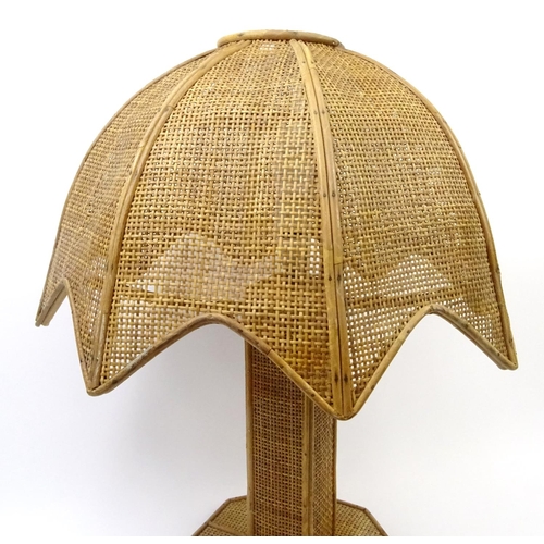 721 - Wicker cane table lamp and shade, 65cm high