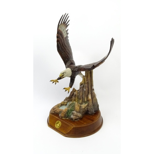 201 - Large painted metal study of a swooping eagle, 44cm high