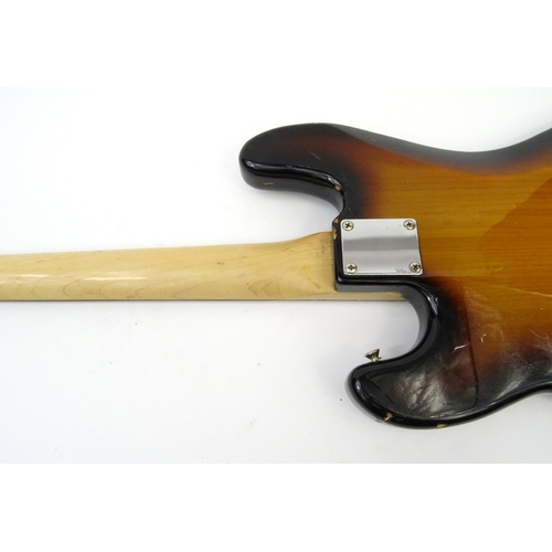 719 - Squire by Fender four string base guitar