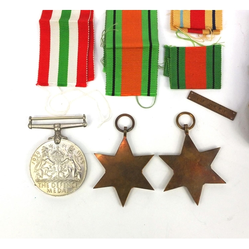 769 - Three Military interest World War II medals comprising the Italy Star, Africa Star and defence medal