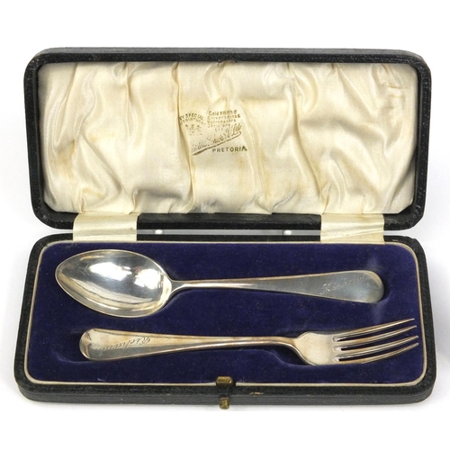 394 - Silver items including a boxed christening fork and spoon, vesta, thimble, egg cup etc, various hall... 