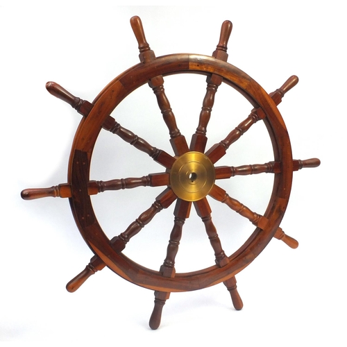 2050 - Wooden ships wheel with brass centre, 122cm in diameter