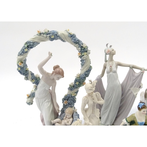 202 - Collectable figures and figurines including two large Lladro examples, the largest 40cm high