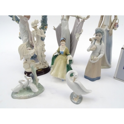 202 - Collectable figures and figurines including two large Lladro examples, the largest 40cm high