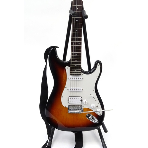 714 - Aria electric guitar STG-series with protective carry case