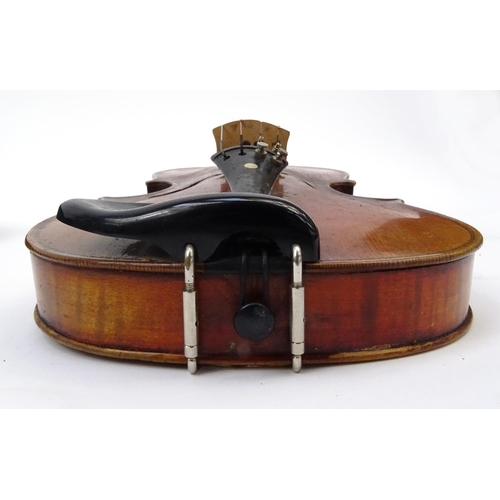 713 - Old violin and bow in a case