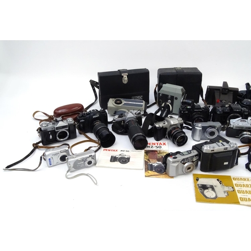 334 - Two boxes of assorted cameras lenses and accessories including Konica, Canon, Nikon and Zenit exampl... 