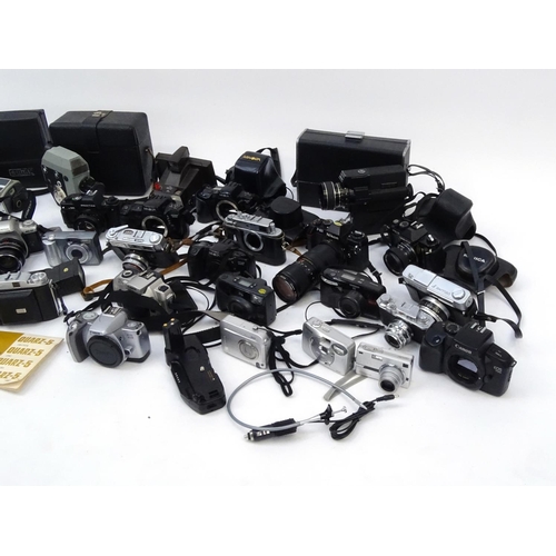 334 - Two boxes of assorted cameras lenses and accessories including Konica, Canon, Nikon and Zenit exampl... 