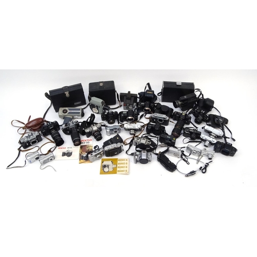 334 - Two boxes of assorted cameras lenses and accessories including Konica, Canon, Nikon and Zenit exampl... 